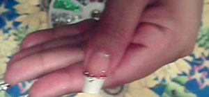 Paint a silver & red rhinestone bling manicure