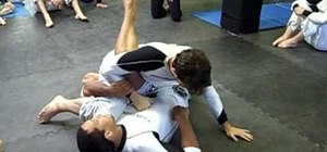Set up an opponent for the flower sweep in Jiu-Jitsu