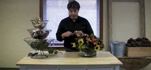 Make a quick DIY Thanksgiving centerpiece out of flowers and vegetables