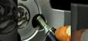 Use the Dynomec locking wheel nut remover