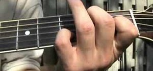 Play "Locked in the Trunk" on the acoustic guitar