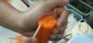 Cut a pretty flower food garnish from a carrot
