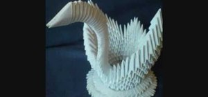 Make a 3D origami swan from 484 paper triangles