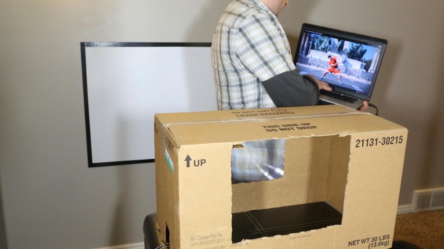How to Make a DIY Home Theater Projector and 50" Screen for Only $5 (Great for March Madness!)