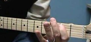 Play a blues shuffle on the guitar