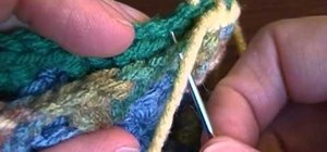 Join two crocheted granny squares together using the whip stich