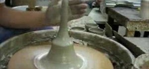 Throw a ceramic teapot on a pottery wheel