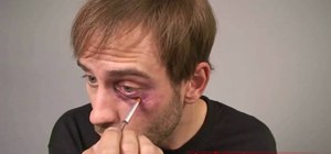 Create a black eye with cinema makeup