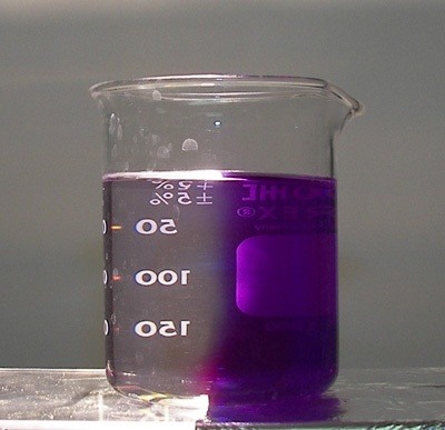 Turn Just Half of a Purple Liquid Clear with the Photochemical "Two-Faced" Reaction