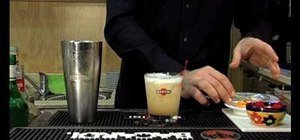 Make a whiskey sour cocktail