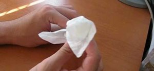 Make an origami rose from paper tissue