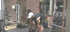 Workout hamstrings with dumbbell stiff leg deadlifts