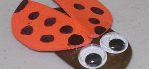 Craft a ladybug using a stone with your kids