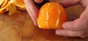 Make orange supremes (slices of orange without membrane or pith)