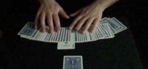 Perform the "ultimate transportation two" card trick