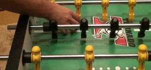 Use stationary stick passing in foosball to control the ball