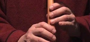 Play "Amazing Grace" on a five-hole flute