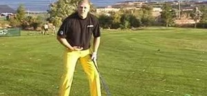 Use smooth backswing to drive a golf ball far