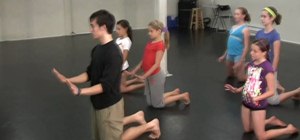 Dance the forward "worm" move, aka "the dolphin" (for kids)