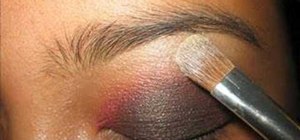 Apply a red, black, and white makeup look