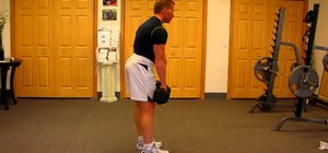 Do standing dumbbell shrugs to tone deltoids and the rear shoulder