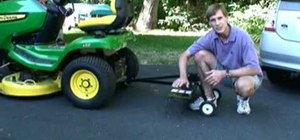 Use a rear attachment dethatcher for a lawnmower to dethatch a lawn