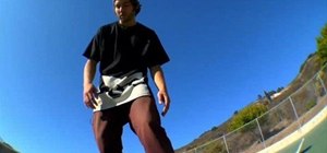 Do a switch backside flip on a skateboard