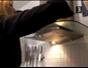 Clean a glass oven hood