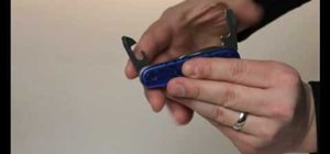 Use a Swiss Army knife can opener