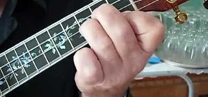 Play the Beatles' "Blackbird" on the ukulele