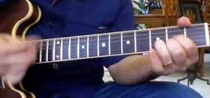 Play "Back in Black" by AC/DC on the guitar