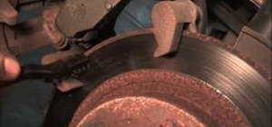 Change the rear brakes on a Ford Taurus