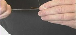 Tie a fly to a fly fishing line