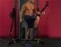Exercise with the standing bent knee cable leg raise