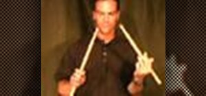 Play the double stroke, or long, roll drum rudiment