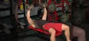 Execute a flat dumbbell press for weightlifting