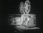 Operate a 16mm motion picture projector
