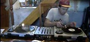 Do back spins on DJ turntables