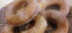 Make fried French beignets (French doughnuts)