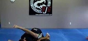 Escape from a triangle choke using a knee pry