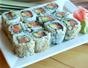 Make spicy salmon maki sushi rolls