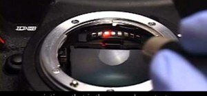 Clean the camera contacts on a DSLR