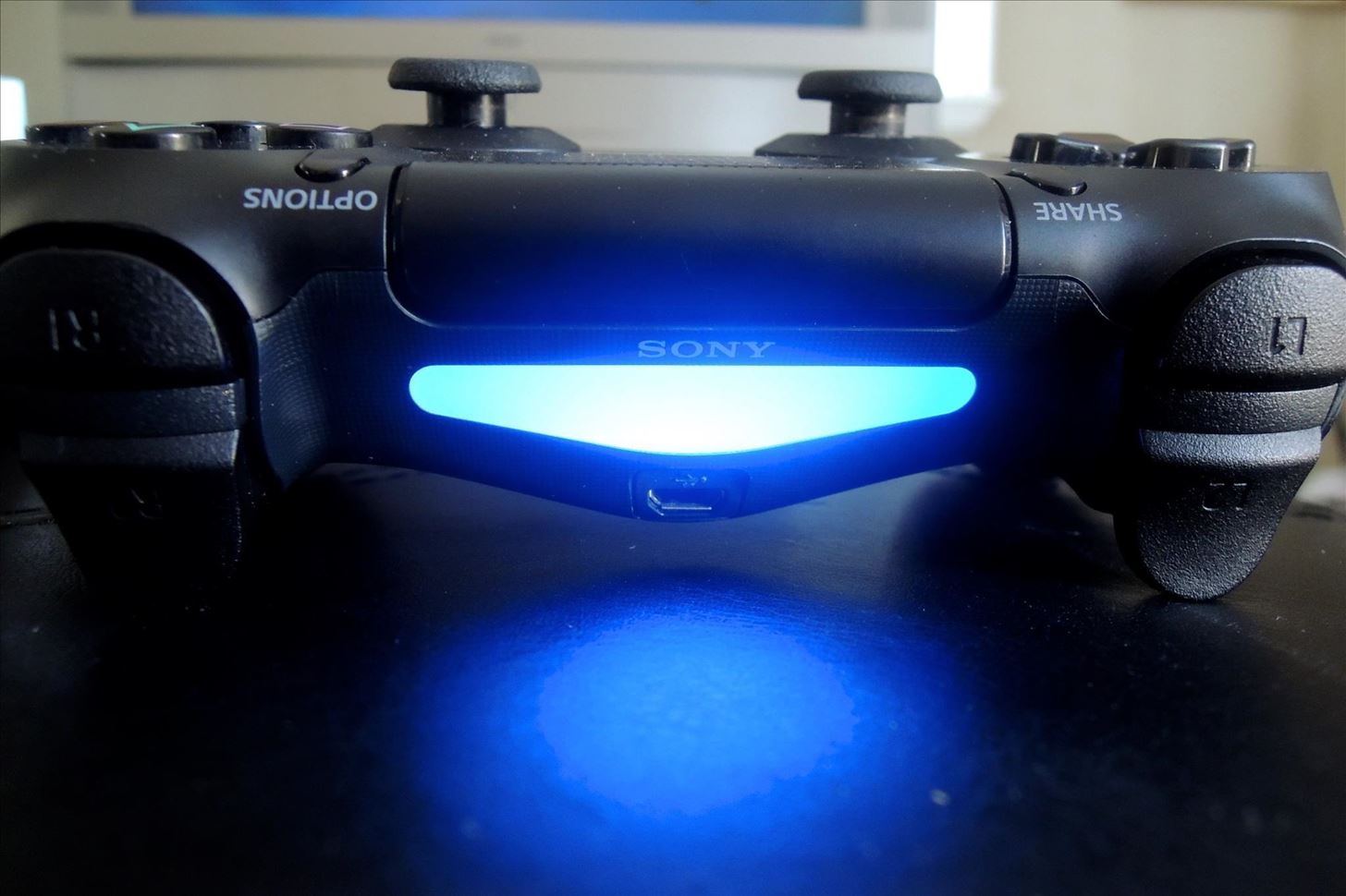 How to Dim the Light on Your PS4's DualShock Controller