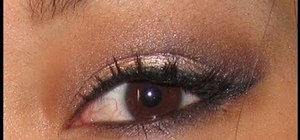 Create a sexy brown and gold cat eye with Urban Decay NAKED