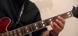 Play the rock/blues scale on the guitar with tabs