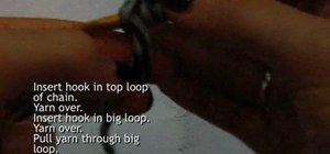Crochet a double crochet stitch into the starting loop