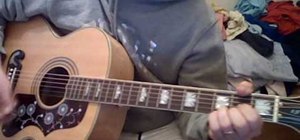 Play "We Can Work It Out" by The Beatles on guitar
