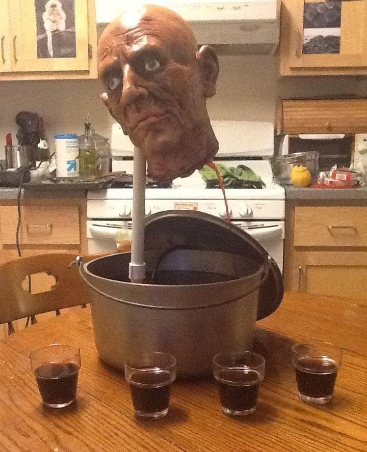 DIY Decapitated Head Drinking Fountain: The Perfect Way to Serve Blood-Red Punch on Halloween