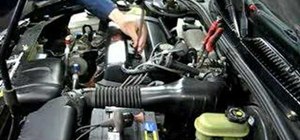Perform a compression check on a Saturn S-Series car