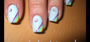 Paint rainbow nails with rhinestones